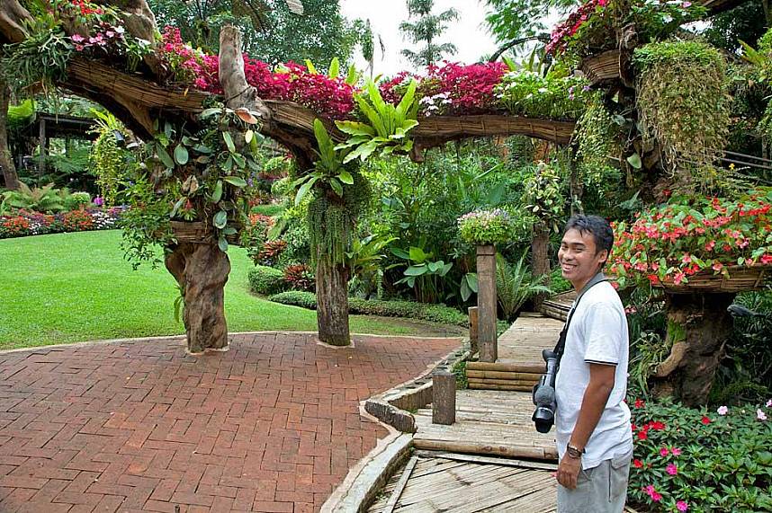 All smiles when visiting the amazing gardens at Enjoy during your North Thailand tour a walk in the gardens of Doi Tung Mountain Chiang Rai