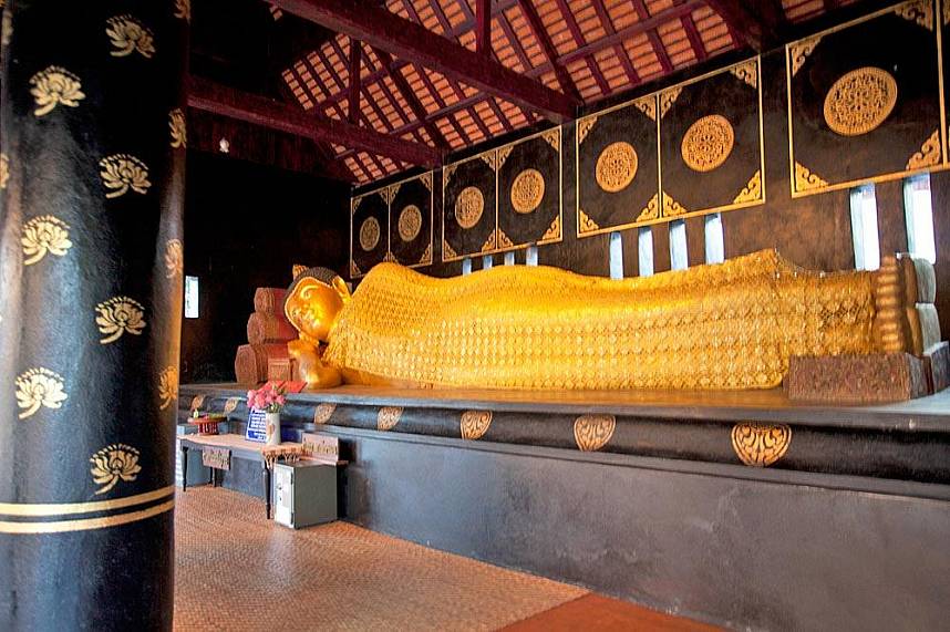 Beautiful reclining Buddha in one of the Chiang Mai Thai Temples