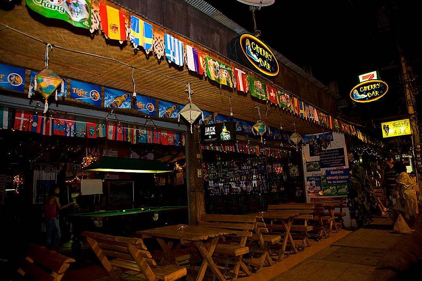 Small rustic bars at Walking Street in Chiang Mai invite travelers for a drink