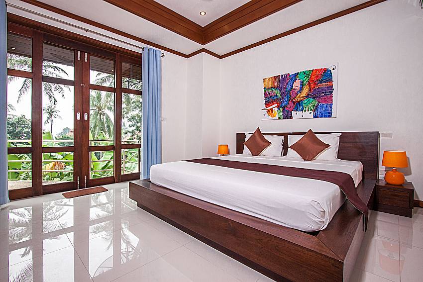 Bedroom overlooking outside of Ban Talay Khaw T26 (Four)