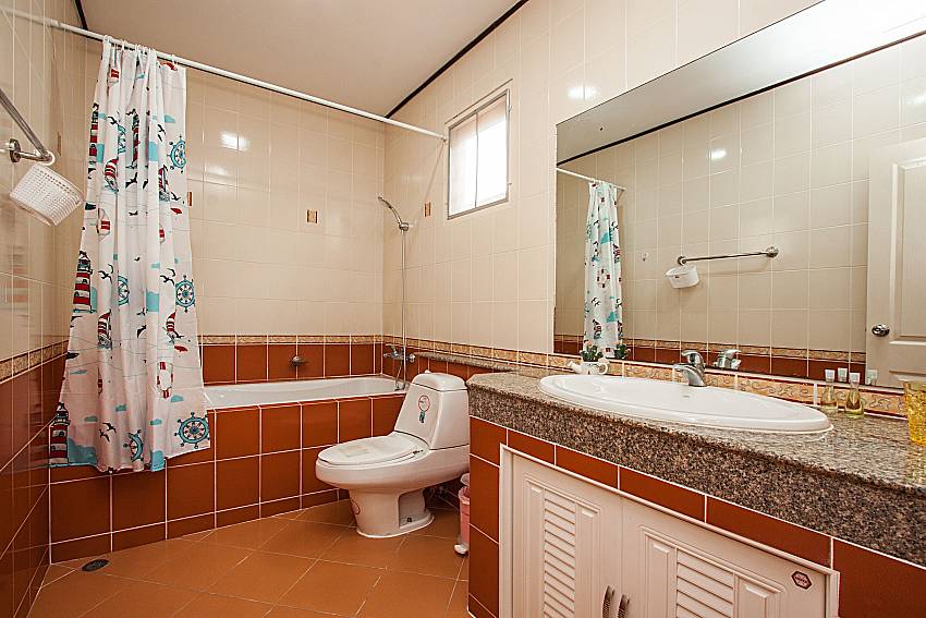Toilet with jacuzzi tub of Jomtien Summertime Villa C