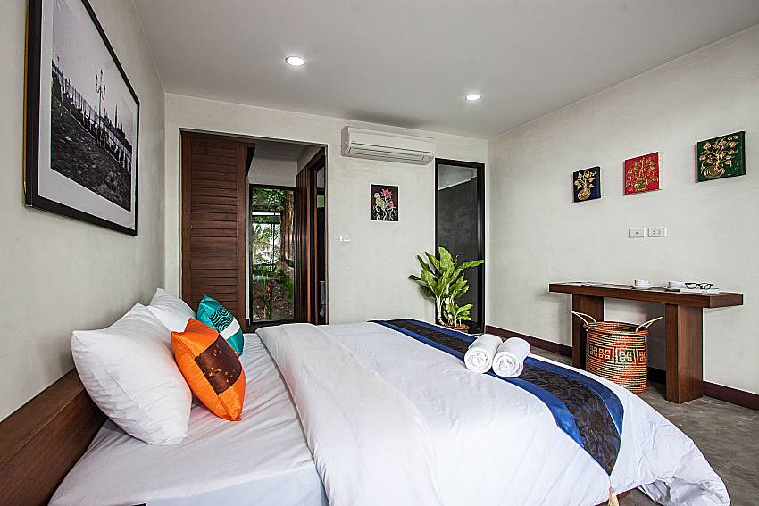 Bedroom with shelves of Paritta Sky Villa A (First)
