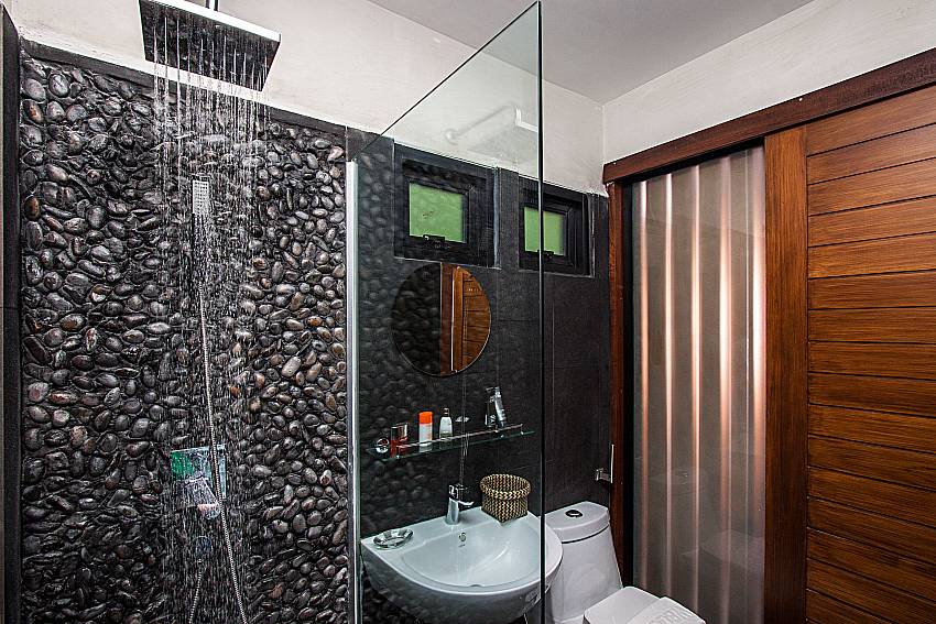 Bathroom with shower and toilet of Paritta Sky Villa A