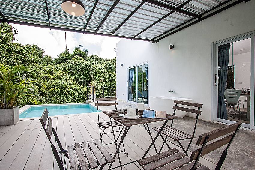 Small table next to the pool of Chaweng Design Villa No.5
