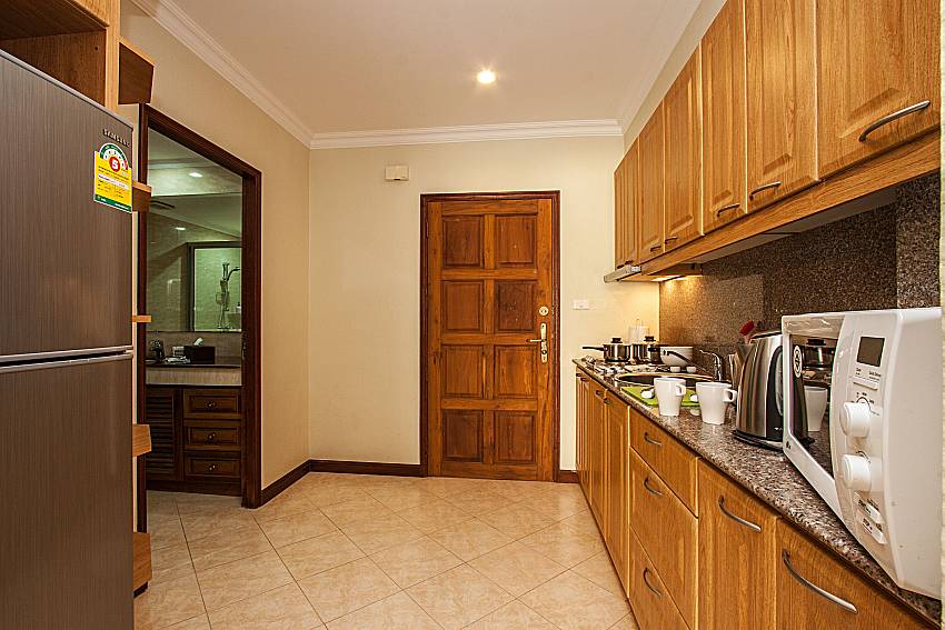 Kitchen with refrigerator of Sirinda Residence No.28