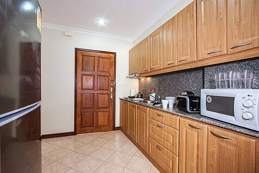 Refrigerator in the kitchen of Sirinda Residence No.52