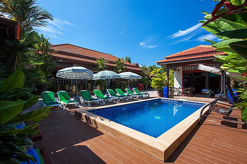 Sun bed near swimming pool Villa Somchair in Phuket