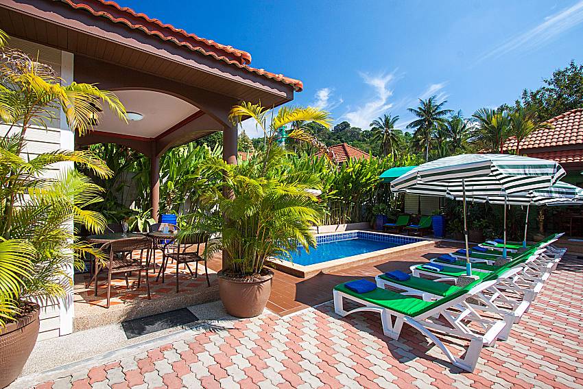 Sun bed near swimming pool Villa Somchair in Phuket