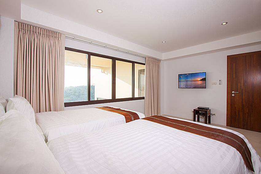 Bedroom with TV Villa Ram Phai in Samui