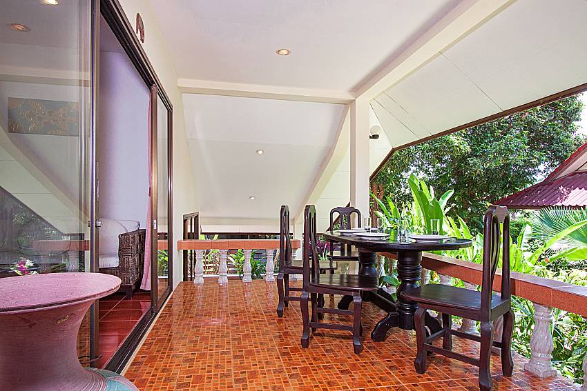 Balcony with seat and table Happiness Villa B in Samui