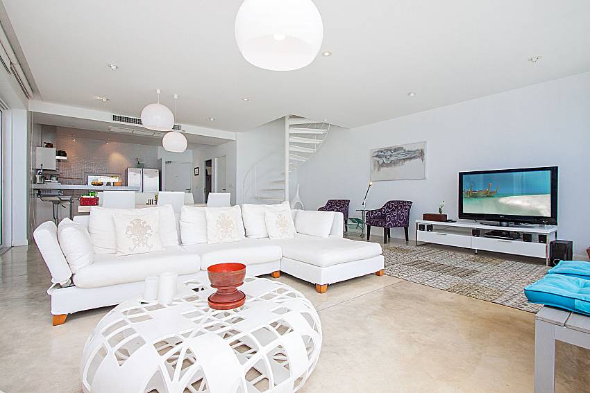 Living room with TV Sirinda Samui Sea View Apartment in Samui 
