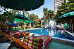 Sun bed near swimming pool Villa Nobility Jomtien Beach in Pattaya