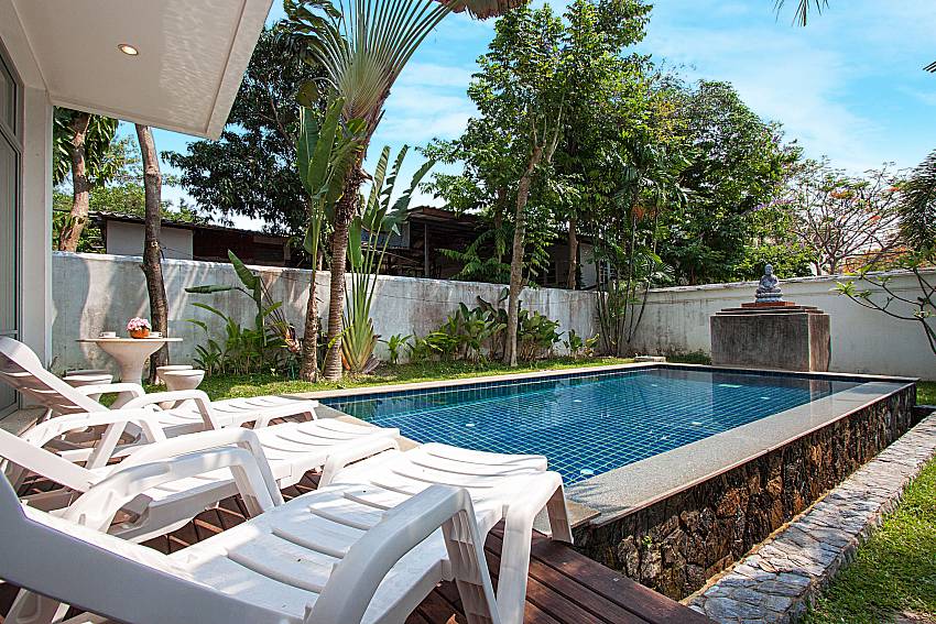 Sun bed near swimming pool Baan Mork Nakara B in East Pattaya
