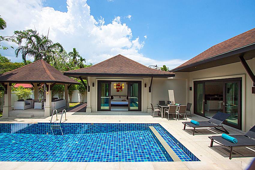 Sun bed near swimming pool Villa Rachana in Phuket