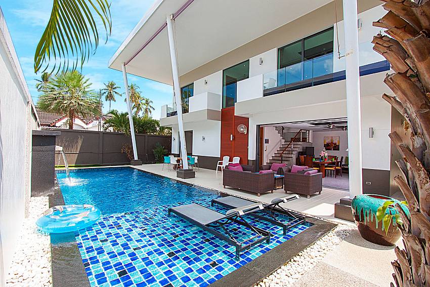 Sun bed near swimming pool Villa Elina in Phuket