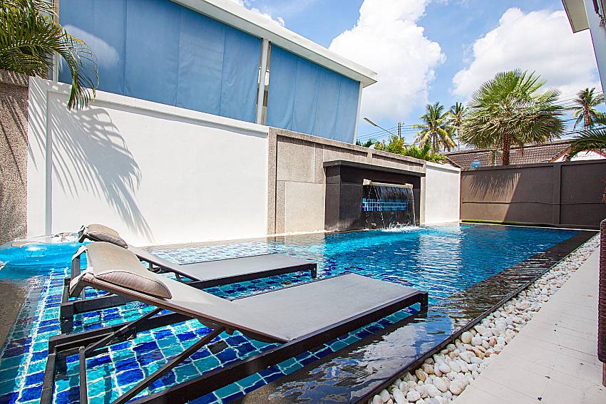 Sun bed near swimming pool Villa Elina in Phuket
