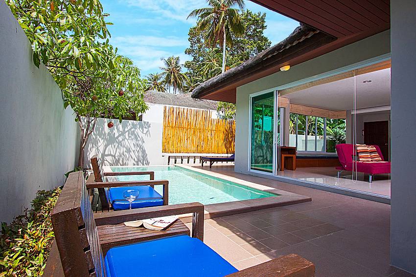 Seat and table near swimming pool Moonscape Villa 204 in Samui