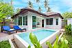 Sun bed near swimming pool and property Moonscape Villa 205 in Samui