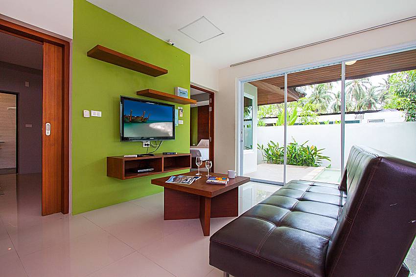 Living room with TV Moonscape Villa 203 in Koh Samui