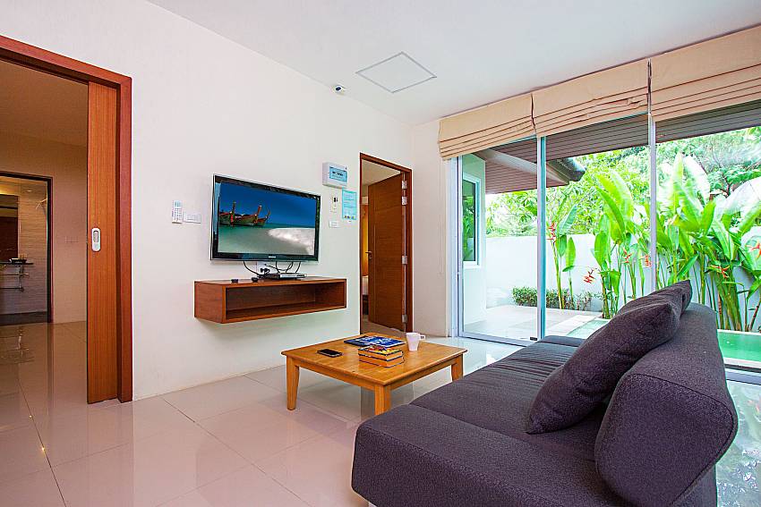 Living room with TV Moonscape Villa 202 at Chaweng in Samui