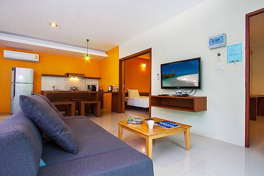 Living room with TV Moonscape Villa 202 at Chaweng in Samui