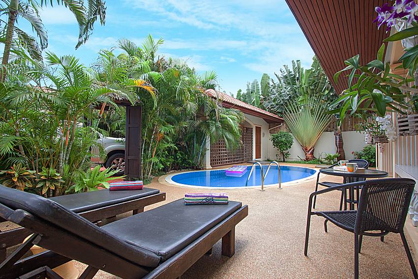 Sun bed near swimming pool and property Genna in Rawai Phuket