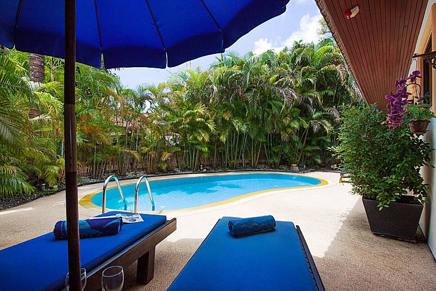 Sun bed near swimming pool Villa Onella in Phuket