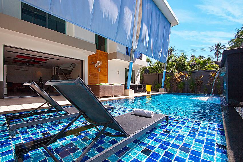 Sun bed near swimming pool Villa Fullan in Phuket