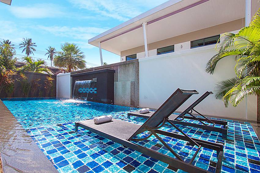 Sun bed near swimming pool Villa Fullan in Phuket