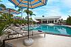 Sun bed near swimming pool Lannister Villa Resort in Bangsaray Pattaya