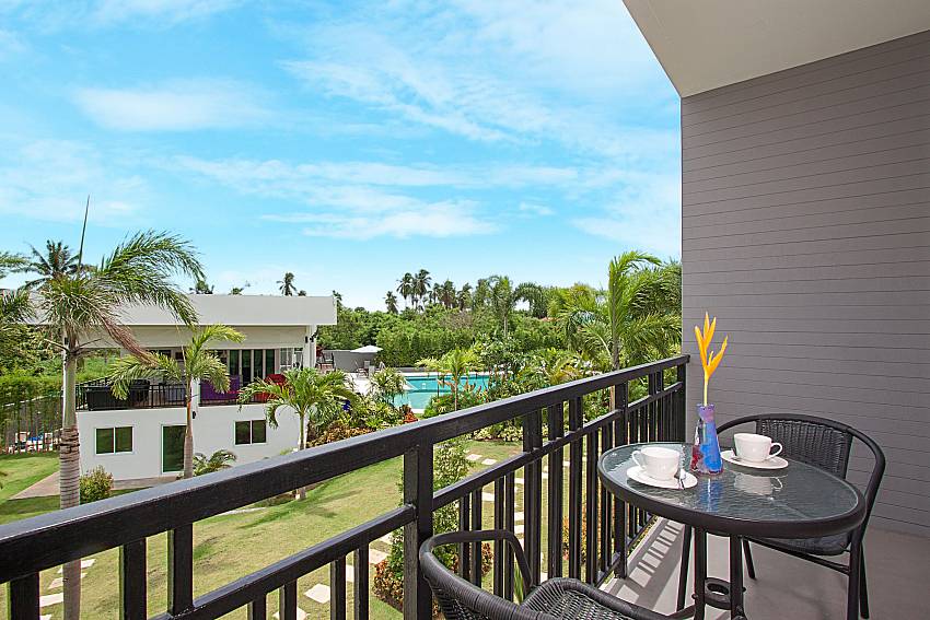 Balcony with seat and table Lannister Villa Resort in Bangsaray Pattaya