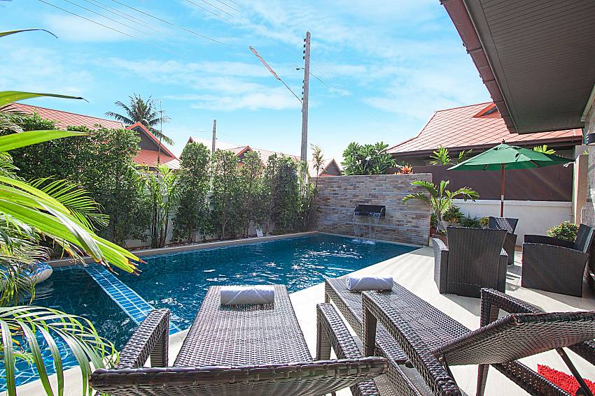 Sun bed near swimming pool Casterly Villa in Jomtien Pattaya