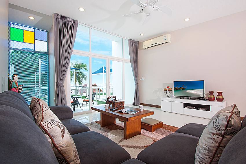 Bedroom with TV Bangsaray Beach House B at Bangsaray Pattaya