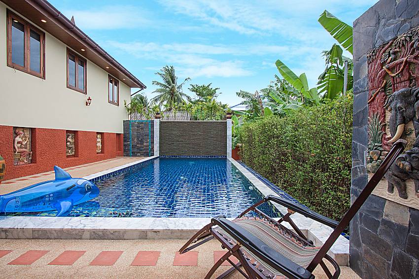 Seat near swimming pool Swy Residence in Koh Samui