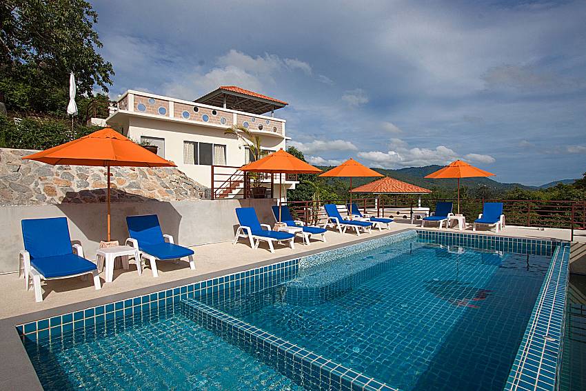 Sun bed near swimming pool and property Villa Mak Di 201 in Samui