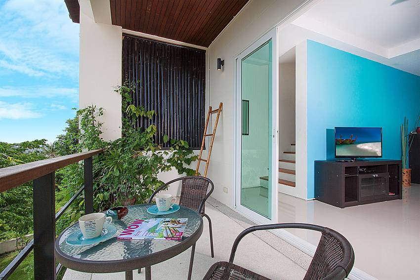 Balcony with seat and table Villa Janani 303 in Samui