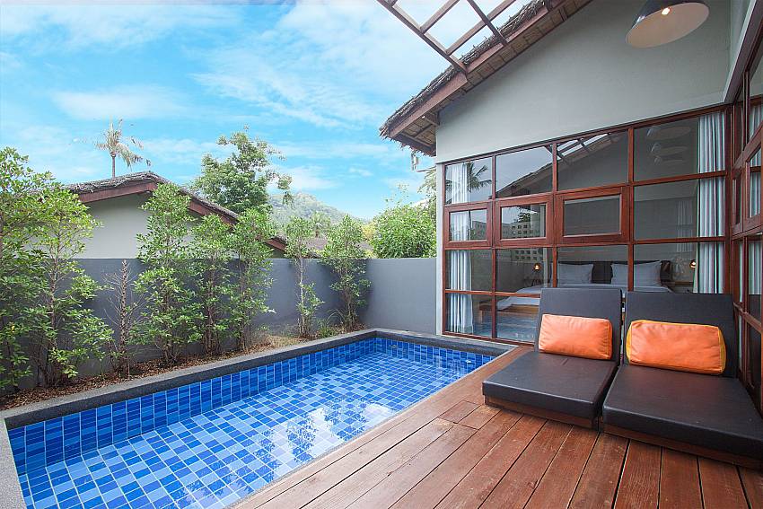 Sun bed near swimming pool with property Villa Rune 202 in Koh Samui