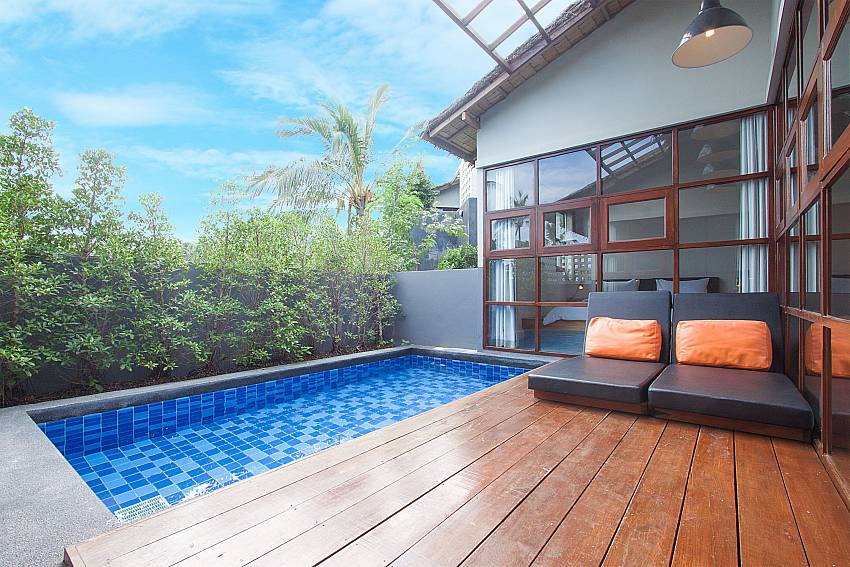 Sun bed near swimming pool with property Villa Rune 203 in Chaweng Samui