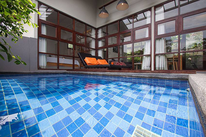 Sun bed near swimming pool with property Villa Rune 115 in Chaweng Samui