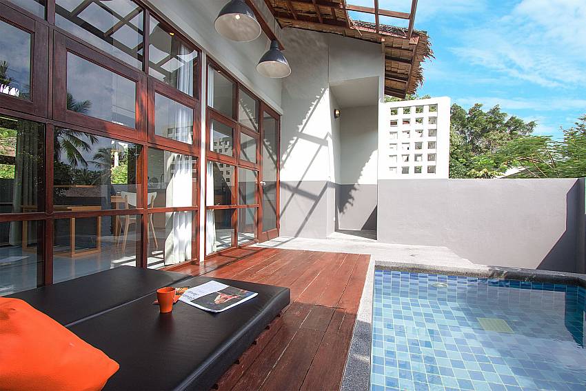 Sun bed near swimming pool with property Villa Rune 116 in Chaweng on Samui