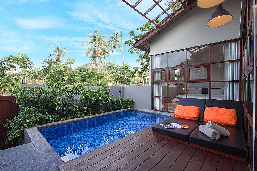 Sun bed near swimming pool with property Villa Rune 117 in Chaweng on Samui
