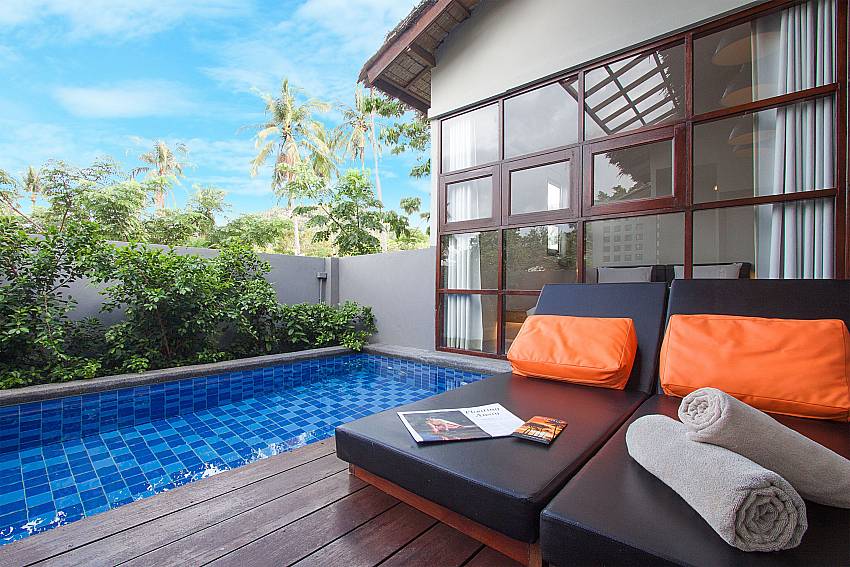Sun bed near swimming pool with property Villa Rune 117 in Chaweng on Samui