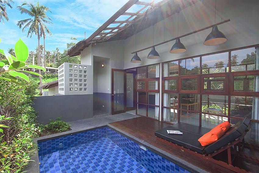 Sun bed near swimming pool with property Villa Rune 121 in Chaweng Samui