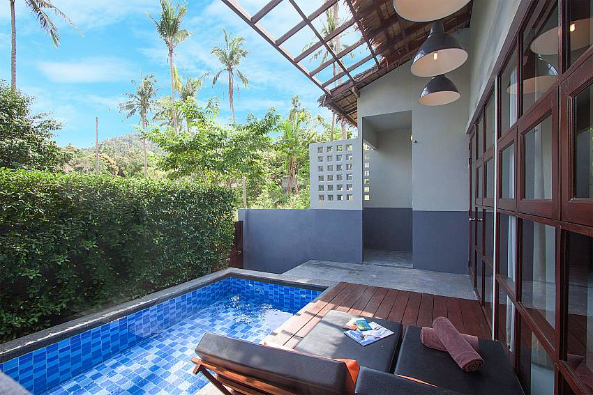 Sun bed near swimming pool with property Villa Rune 123 in Chaweng on Samui