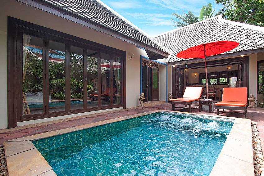 Sun bed near swimming pool with property Villa Baylea 202 in Koh Samui