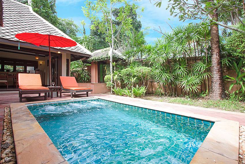 Sun bed near swimming pool with property Villa Baylea 202 in Koh Samui