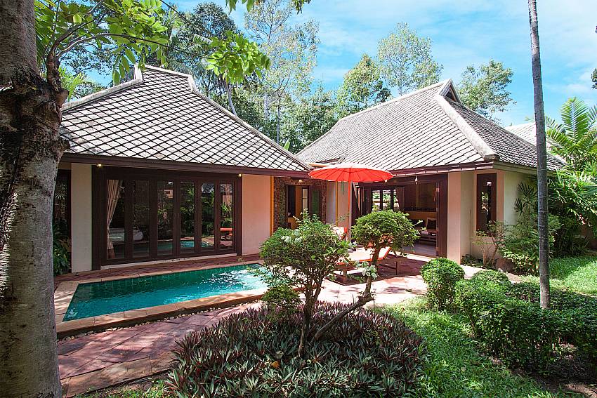 Sun bed near swimming pool with property Villa Baylea 203 in Koh Samui