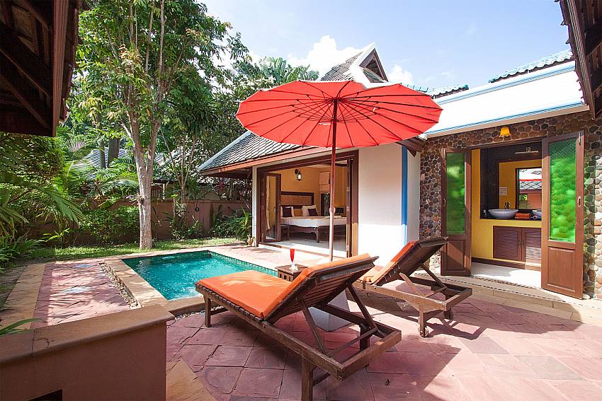 Sun bed near swimming pool with property Villa Baylea 101 in Chaweng Samui