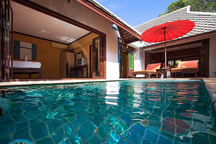 Sun bed near swimming pool with property Villa Baylea 101 in Chaweng Samui