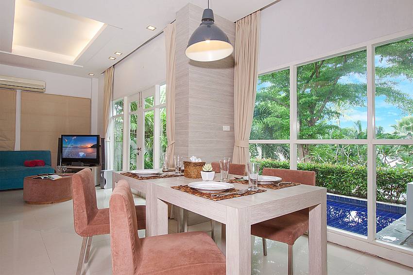 Living and dining area with pool view in Villa Hutton 201 Samui Bo Phut